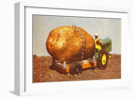 Giant Potato on Toy Tractor-null-Framed Art Print