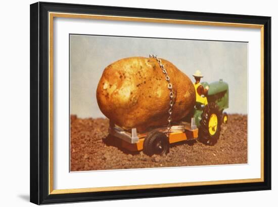 Giant Potato on Toy Tractor-null-Framed Art Print