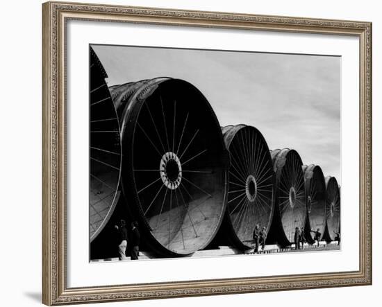 Gigantic Pipe Segments Used for Diverting the Missouri River During Construction of Fort Peck Dam-Margaret Bourke-White-Framed Photographic Print