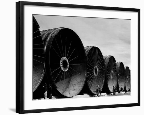 Gigantic Pipe Segments Used for Diverting the Missouri River During Construction of Fort Peck Dam-Margaret Bourke-White-Framed Photographic Print