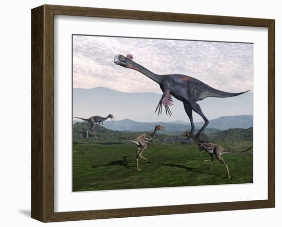 Gigantoraptor Surrounded by Small Mononykus Dinosaurs-Stocktrek Images-Framed Art Print