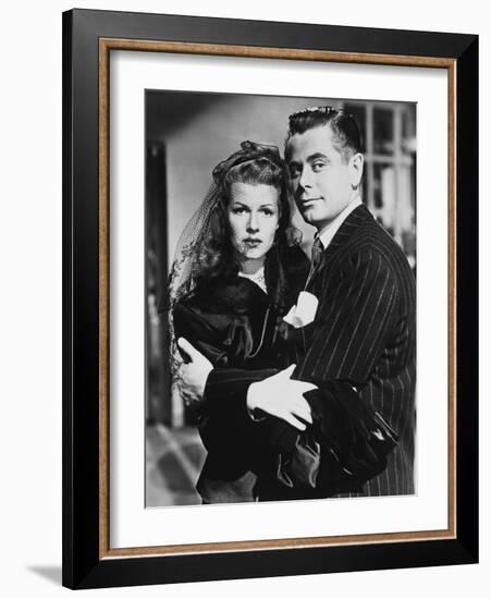 GILDA, 1946 directed by CHARLES VIDOR Rita Hayworth and Glenn Ford (b/w photo)-null-Framed Photo