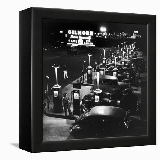Gilmore Gas Station Featuring Eight Islands, Three Pumps Each, Girl Makes Change Every Two Islands-Allan Grant-Framed Premier Image Canvas