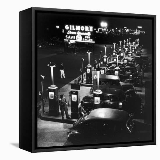 Gilmore Gas Station Featuring Eight Islands, Three Pumps Each, Girl Makes Change Every Two Islands-Allan Grant-Framed Premier Image Canvas