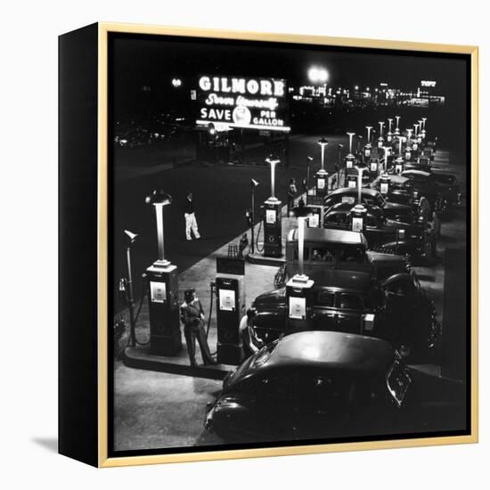 Gilmore Gas Station Featuring Eight Islands, Three Pumps Each, Girl Makes Change Every Two Islands-Allan Grant-Framed Premier Image Canvas