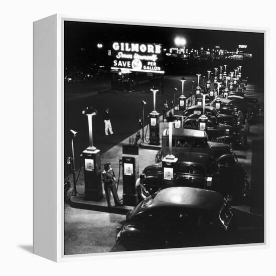 Gilmore Gas Station Featuring Eight Islands, Three Pumps Each, Girl Makes Change Every Two Islands-Allan Grant-Framed Premier Image Canvas