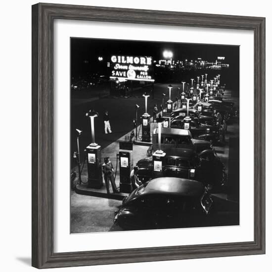 Gilmore Gas Station Featuring Eight Islands, Three Pumps Each, Girl Makes Change Every Two Islands-Allan Grant-Framed Photographic Print