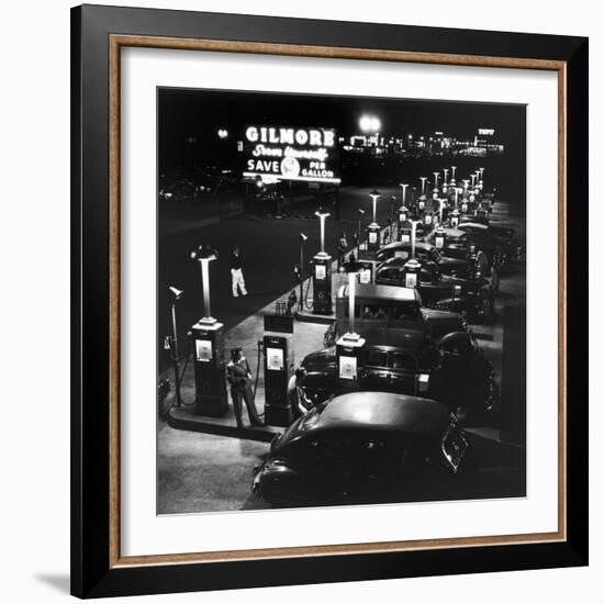 Gilmore Gas Station Featuring Eight Islands, Three Pumps Each, Girl Makes Change Every Two Islands-Allan Grant-Framed Photographic Print