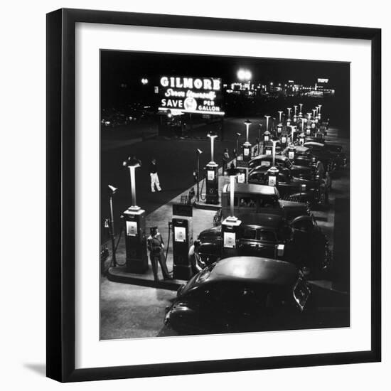 Gilmore Gas Station Featuring Eight Islands, Three Pumps Each, Girl Makes Change Every Two Islands-Allan Grant-Framed Photographic Print