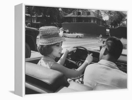 Gina Lollobrigida Taking a Driving Lesson-Peter Stackpole-Framed Premier Image Canvas