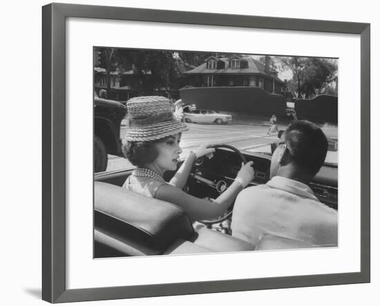 Gina Lollobrigida Taking a Driving Lesson-Peter Stackpole-Framed Premium Photographic Print