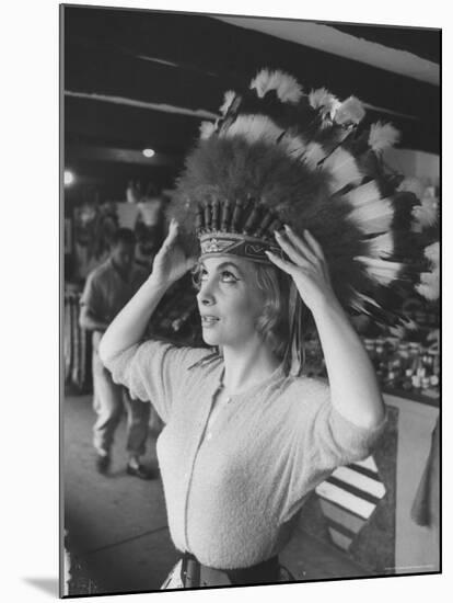 Gina Lollobrigida Trying on Native American Head Piece-Peter Stackpole-Mounted Premium Photographic Print