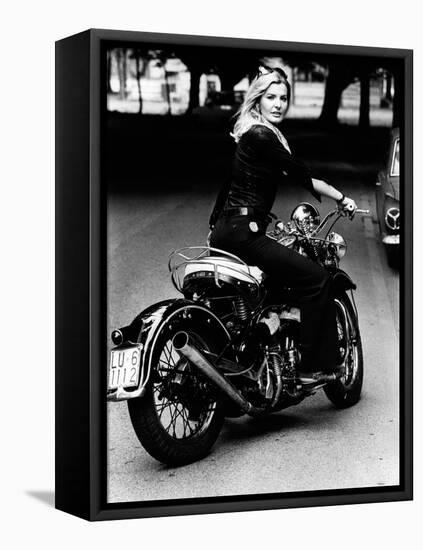 Giovanna Rides a High-powered Motorbike-null-Framed Premier Image Canvas