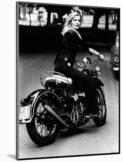 Giovanna Rides a High-powered Motorbike-null-Mounted Photographic Print