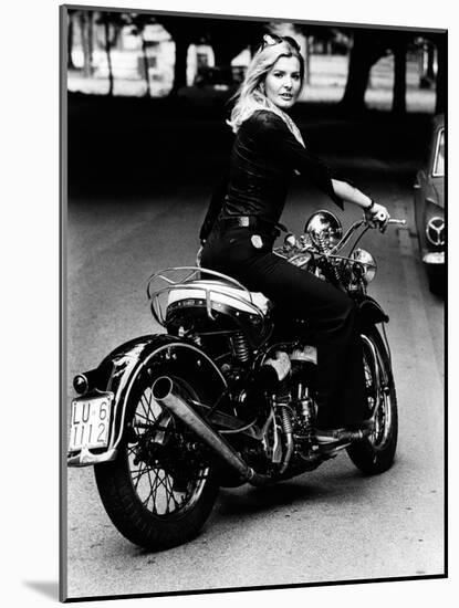 Giovanna Rides a High-powered Motorbike-null-Mounted Photographic Print