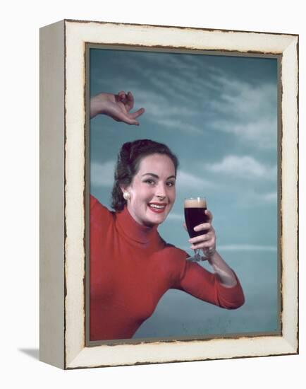 Girl and Guinness 1950s-Charles Woof-Framed Premier Image Canvas