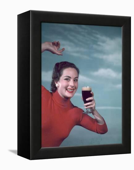 Girl and Guinness 1950s-Charles Woof-Framed Premier Image Canvas