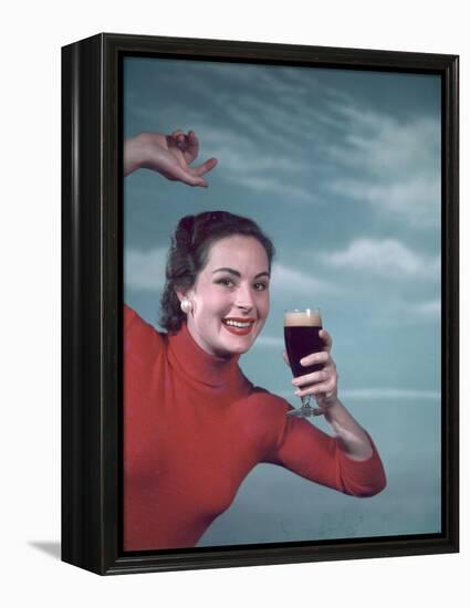 Girl and Guinness 1950s-Charles Woof-Framed Premier Image Canvas