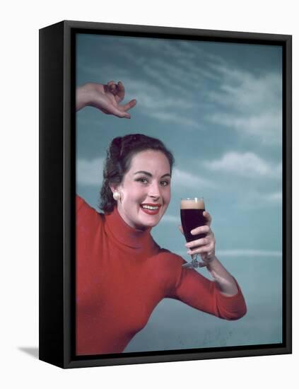 Girl and Guinness 1950s-Charles Woof-Framed Premier Image Canvas