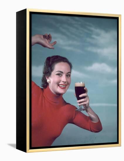 Girl and Guinness 1950s-Charles Woof-Framed Premier Image Canvas
