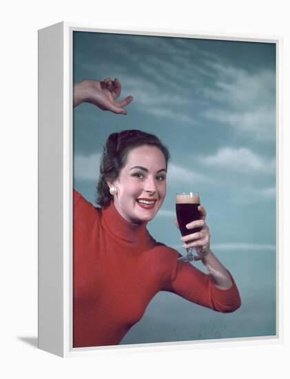 Girl and Guinness 1950s-Charles Woof-Framed Premier Image Canvas