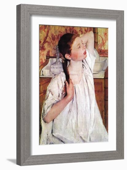 Girl Arranging Her Hair-Mary Cassatt-Framed Art Print