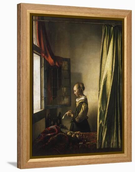 Girl at a Window Reading a Letter, about 1658-Johannes Vermeer-Framed Premier Image Canvas