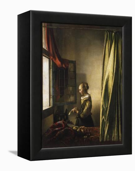 Girl at a Window Reading a Letter, about 1658-Johannes Vermeer-Framed Premier Image Canvas