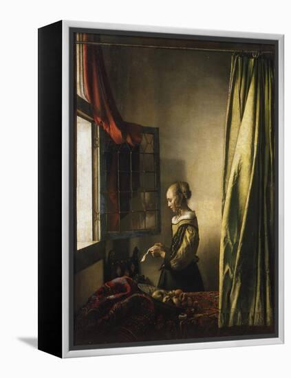 Girl at a Window Reading a Letter, about 1658-Johannes Vermeer-Framed Premier Image Canvas