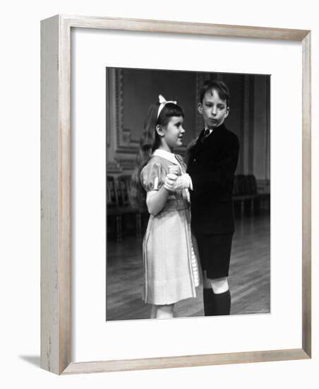 Girl at Ballroom Dancing Class Smiling at Her Partner Who Averts His Glance from Her-Alfred Eisenstaedt-Framed Photographic Print