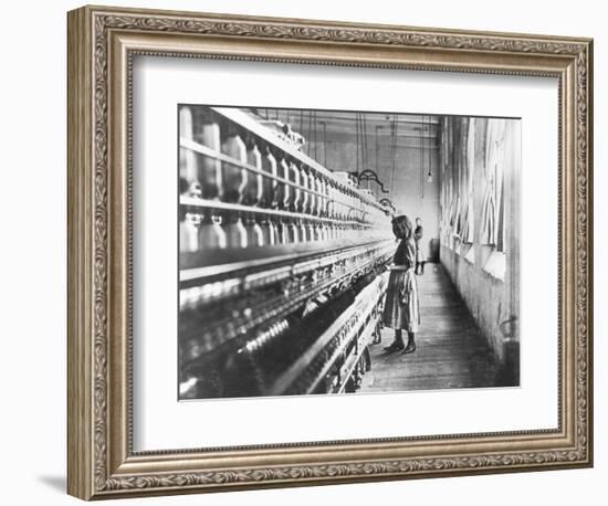 Girl at Spinning Machine-Lewis Wickes Hine-Framed Photographic Print