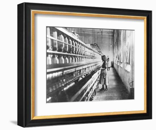 Girl at Spinning Machine-Lewis Wickes Hine-Framed Photographic Print