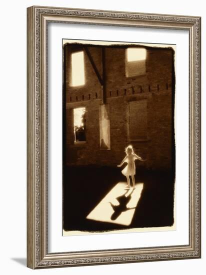 Girl dancing in a shaft of light-Theo Westenberger-Framed Art Print