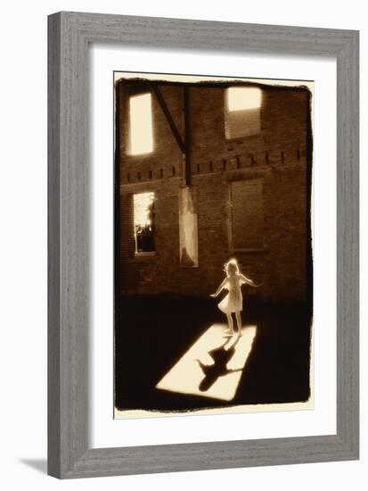 Girl dancing in a shaft of light-Theo Westenberger-Framed Art Print