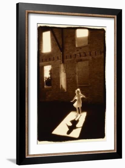 Girl dancing in a shaft of light-Theo Westenberger-Framed Art Print