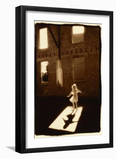 Girl dancing in a shaft of light-Theo Westenberger-Framed Art Print