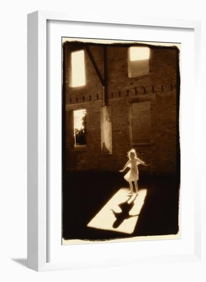 Girl dancing in a shaft of light-Theo Westenberger-Framed Art Print