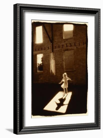 Girl dancing in a shaft of light-Theo Westenberger-Framed Art Print