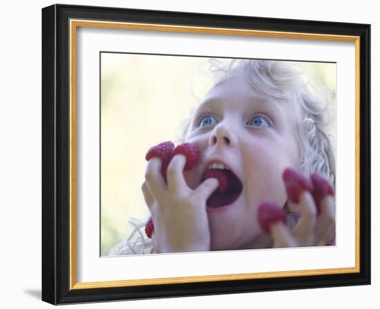 Girl Eating Raspberries, Bellingham, Washington, USA-Steve Satushek-Framed Photographic Print