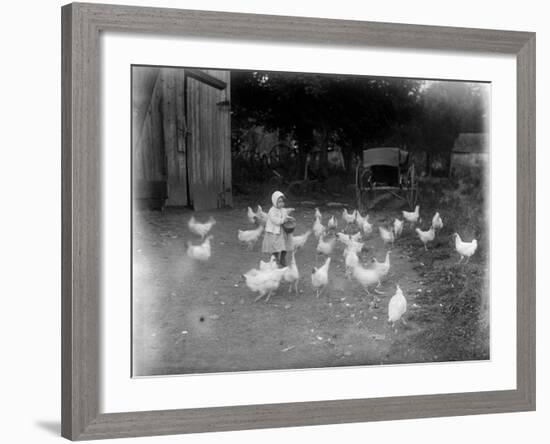 Girl Feeding Chickens-null-Framed Photographic Print