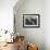 Girl Gazing Pensively Through Pane of Her Apartment Window, Grimly Reflects Image of Berlin Wall-Paul Schutzer-Framed Photographic Print displayed on a wall