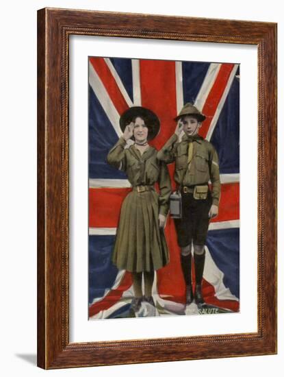 Girl Guide and Boy Scout Saluting in Front of the Union Flag-null-Framed Photographic Print