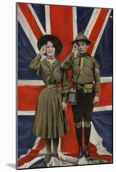 Girl Guide and Boy Scout Saluting in Front of the Union Flag-null-Mounted Photographic Print