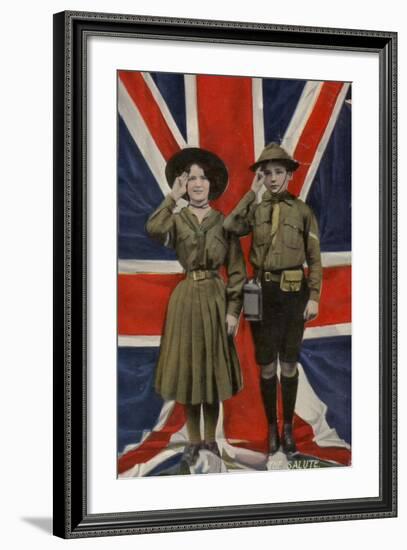 Girl Guide and Boy Scout Saluting in Front of the Union Flag-null-Framed Photographic Print