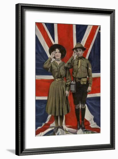 Girl Guide and Boy Scout Saluting in Front of the Union Flag-null-Framed Photographic Print