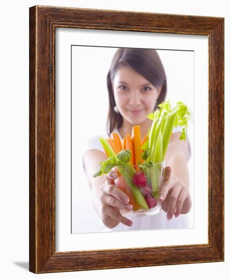 Girl Holding a Bowl of Vegetable Sticks with Radishes-null-Framed Photographic Print