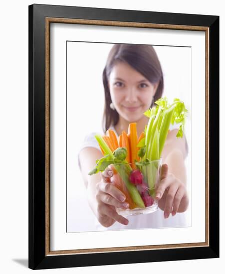 Girl Holding a Bowl of Vegetable Sticks with Radishes-null-Framed Photographic Print