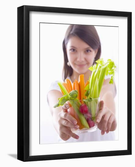 Girl Holding a Bowl of Vegetable Sticks with Radishes-null-Framed Photographic Print