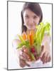 Girl Holding a Bowl of Vegetable Sticks with Radishes-null-Mounted Photographic Print