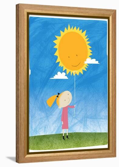 Girl holding a sun balloon-Harry Briggs-Framed Premier Image Canvas